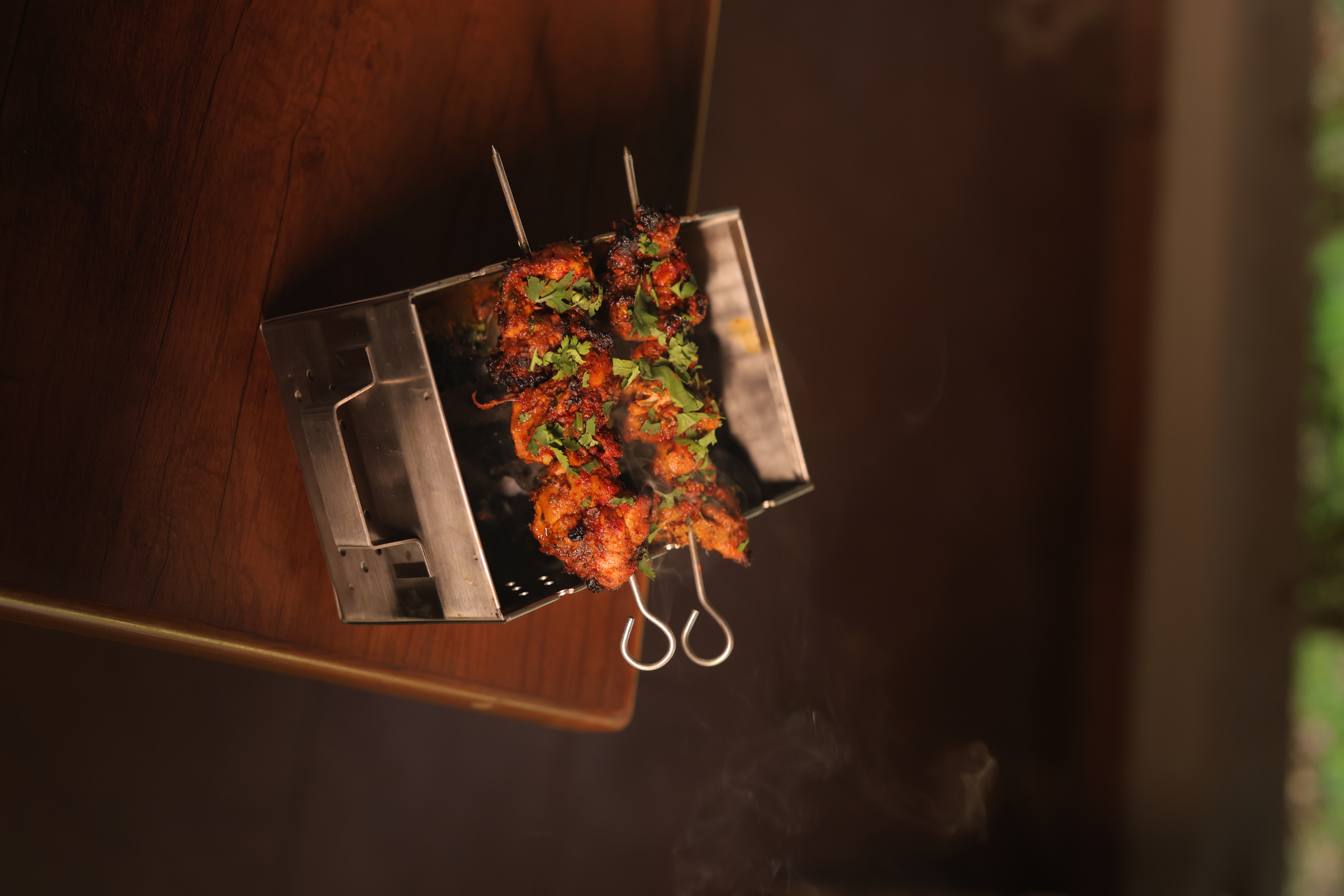Overhead view of succulent chicken tikka skewers at Jatra Countryside
