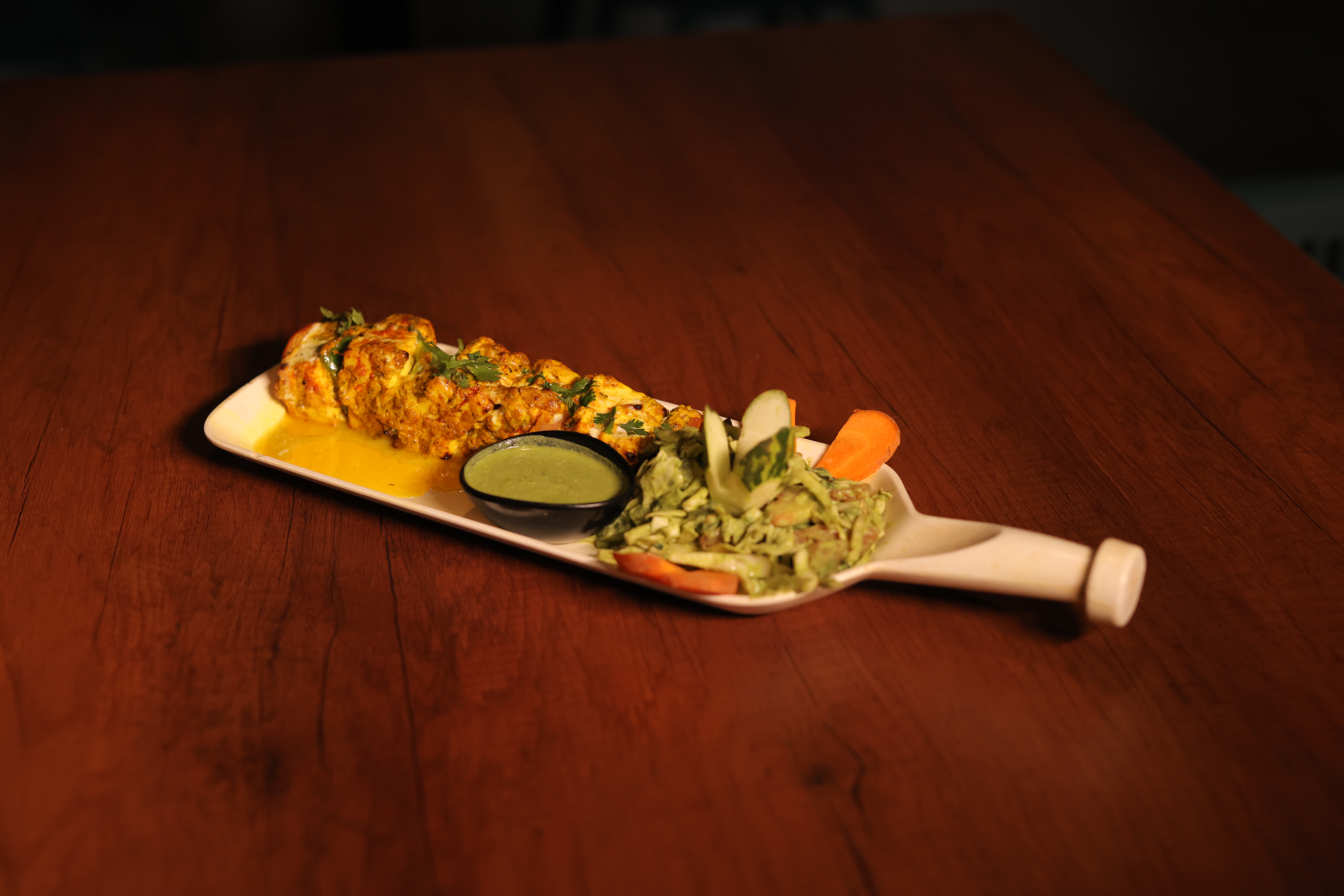Golden paneer tikka platter served on an elegant plate at Jatra Countryside